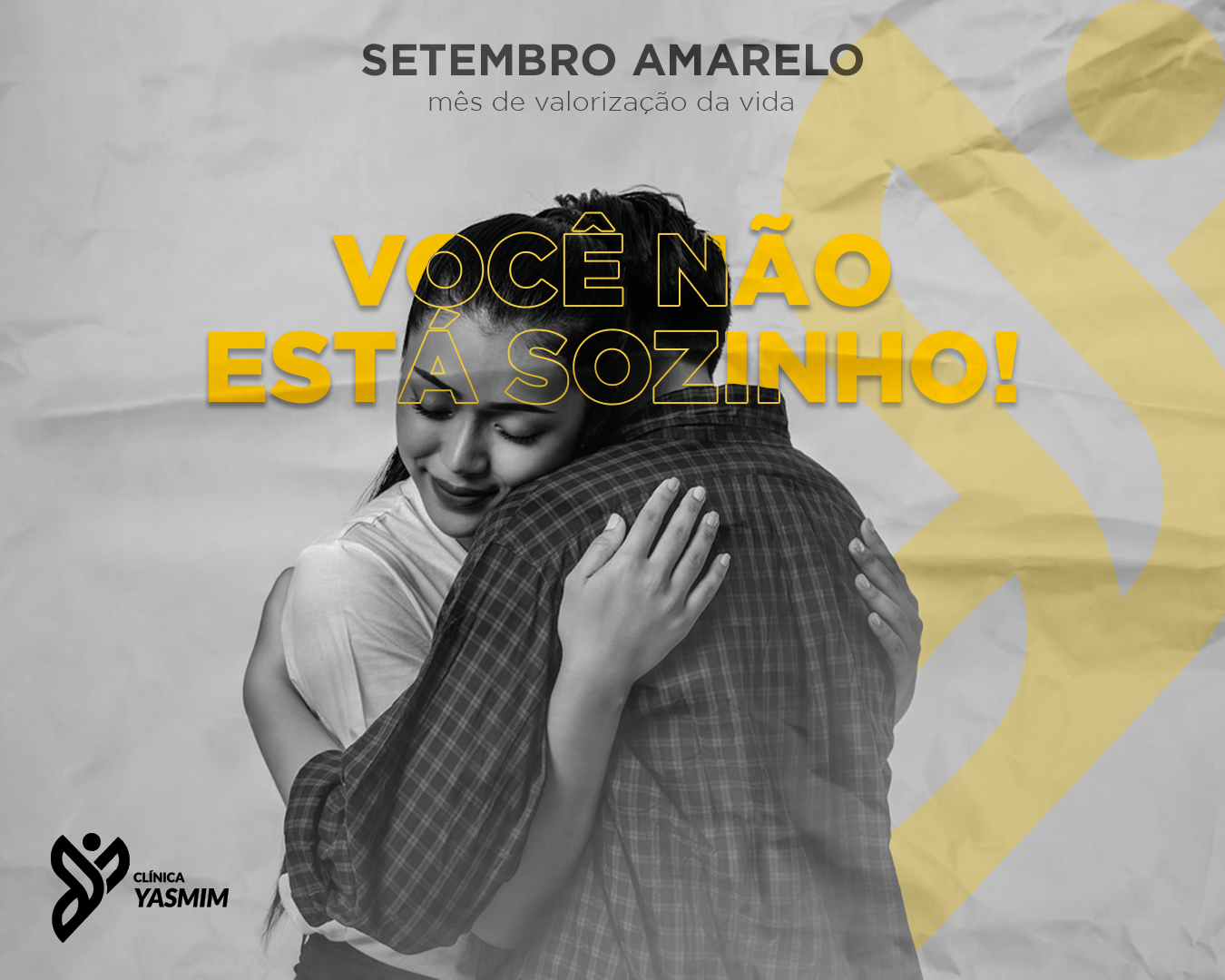 campanha setembro amarelo com duas pessoas se abraçando